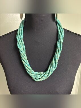 Vintage Elegant turquoise multi-strand wood beaded necklace and earrings.